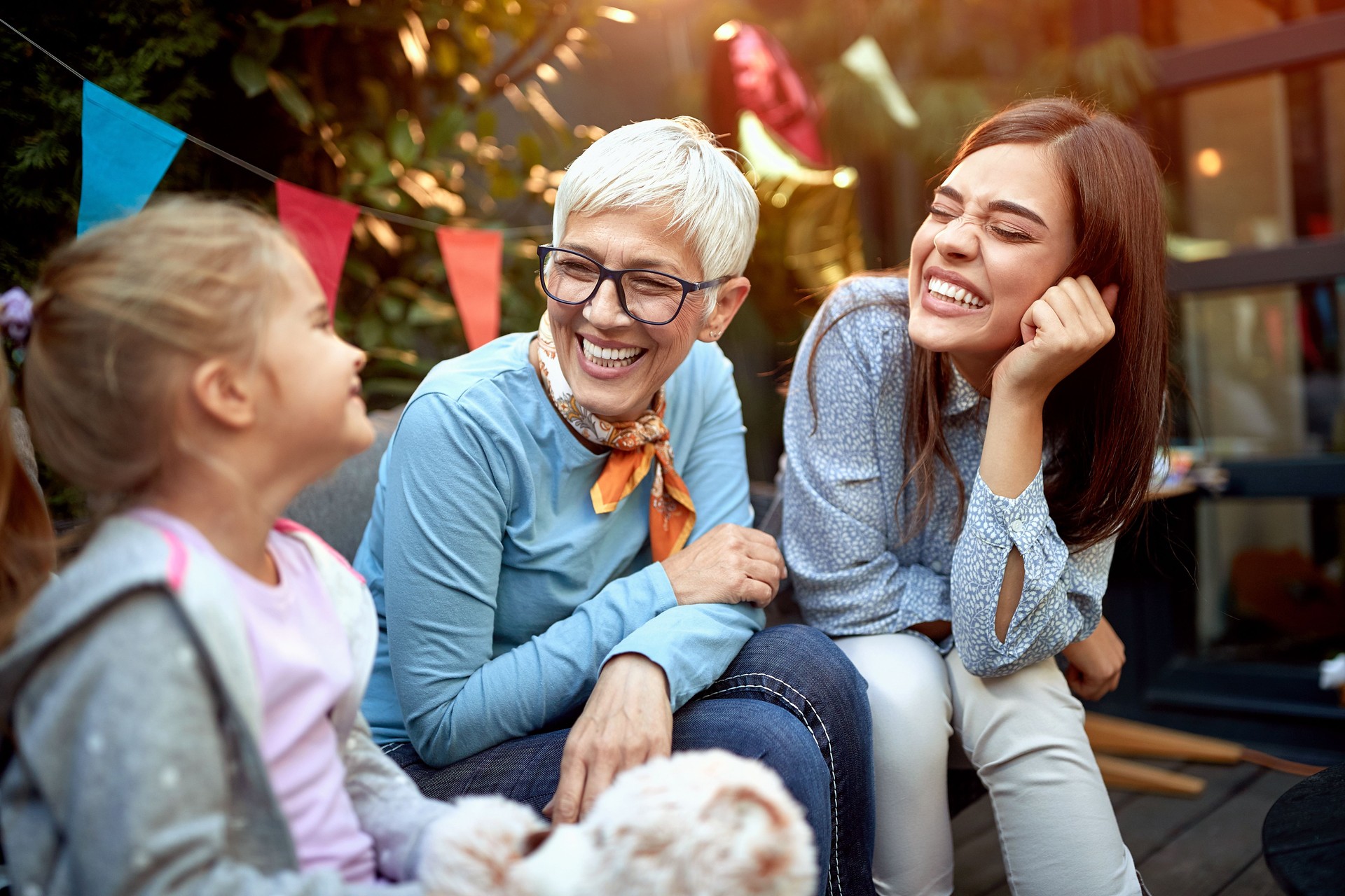 sweet little girl with her mother and grandmother. Three generation concept